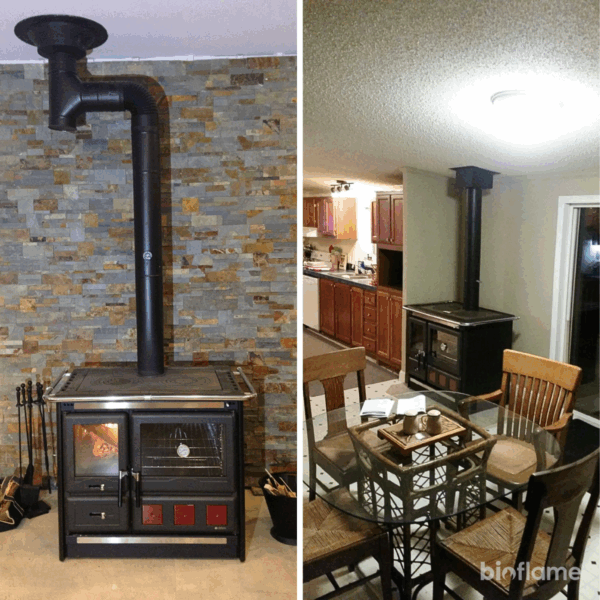 Fogão a Lenha em Ferro Fundido - Nordica Extraflame Rosa XXL instalado entre cozinha e sala de jantar, aquecendo ambos os ambientes.