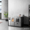 Fogão a Lenha e Pellets para Aquecimento Central - Teba Therm TPW-23 instalado numa cozinha moderna.